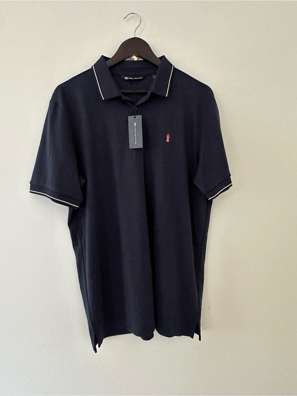NWT Travis Mathew The Sea Pines Resort
 PIPED solid polo total eclipse Navy Sz L